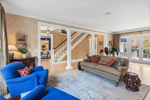 A view from the living room across the entry hall and the dining room.