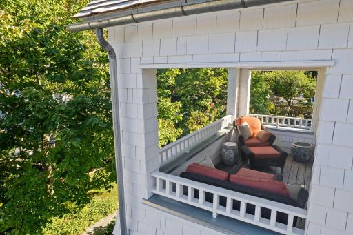 The covered balcony off the primary suite.
