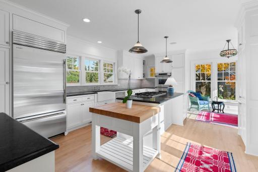 Butcher block and stone counters, plus a brand new refrigerator.