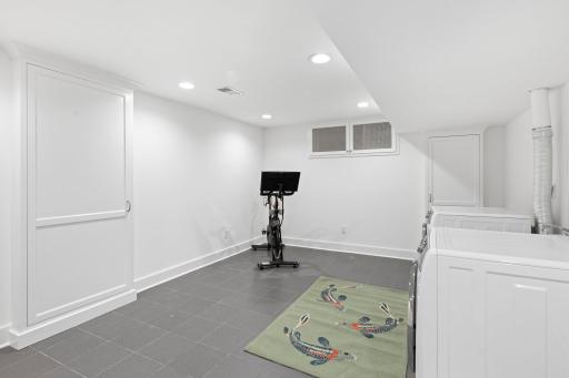 Work-out space, home office, hobby center? This space has many uses