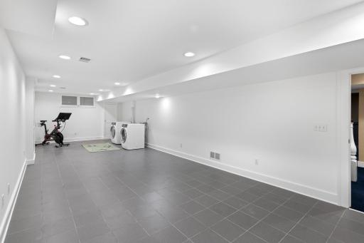 Expansive laundry room that can serve multiple purposes.