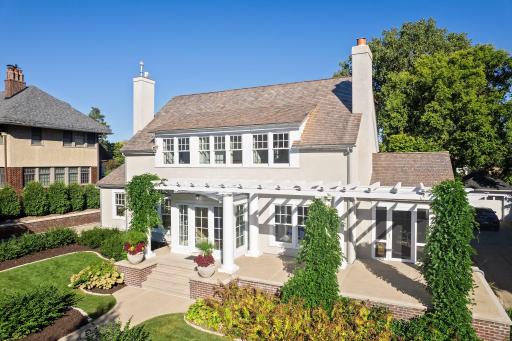 The home is sited on a double lot with beautiful landscaping