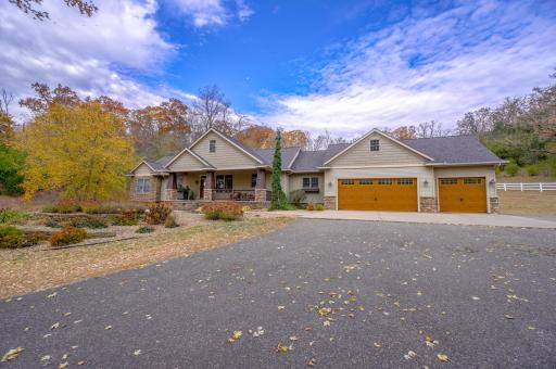 Andersen windows throughout, steel siding, and new roofs on all buildings ensure durability and peace of mind. The heated and attached 3-car garage offers ample workspace and vehicle storage. (New shingles-August 2024).