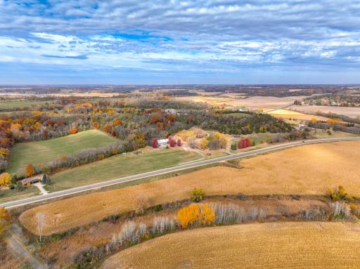With over 22 acres of open fields, rolling hills, wooded areas with hiking trails, & abundant wildlife, this property offers a serene retreat w/generous space for horses/hobby farm, endless outdoor enjoyment, & the potential for further development.