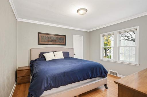 Primary bedroom on the main level features a walk in closet.