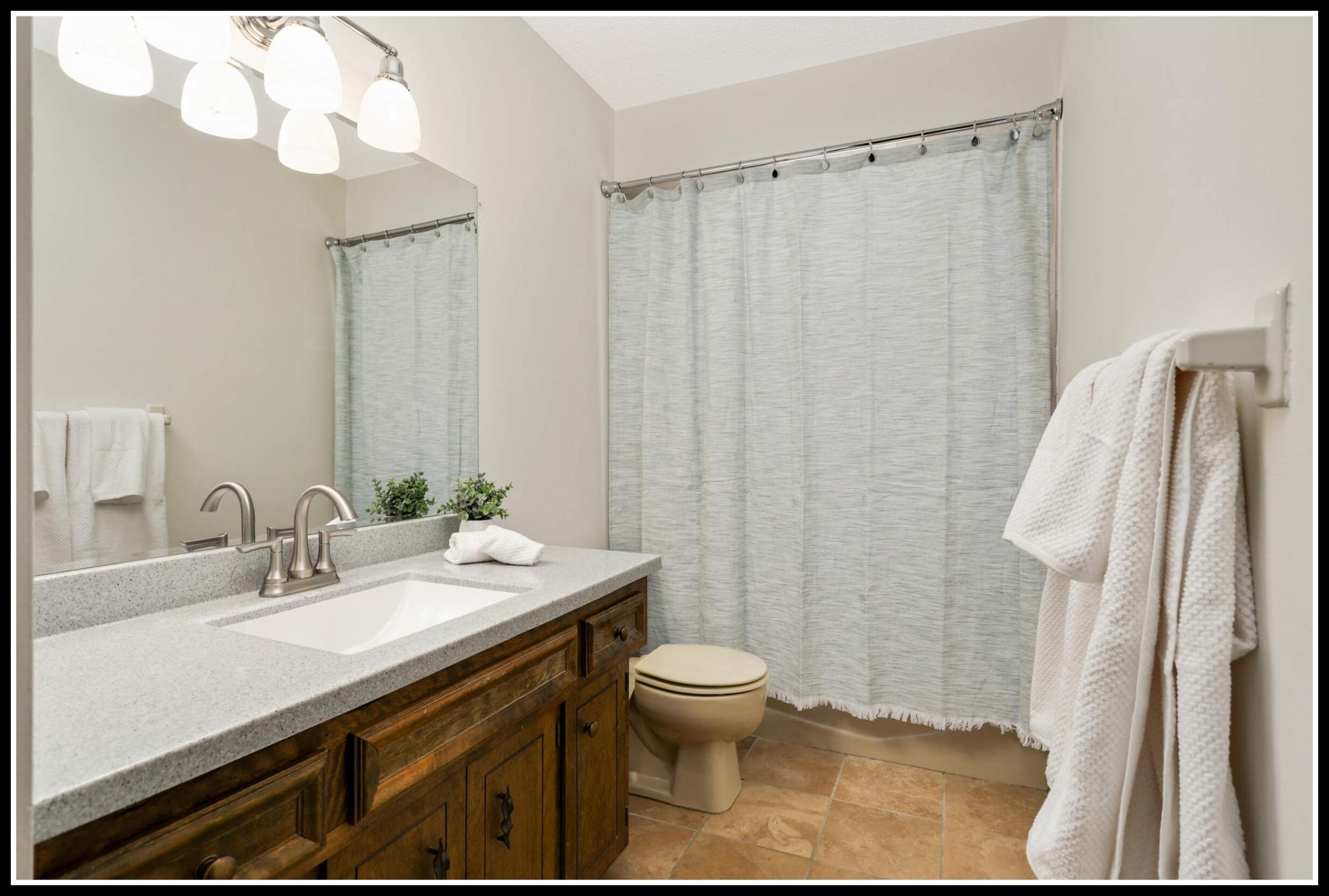 An additional bathroom (full) serves the upper level