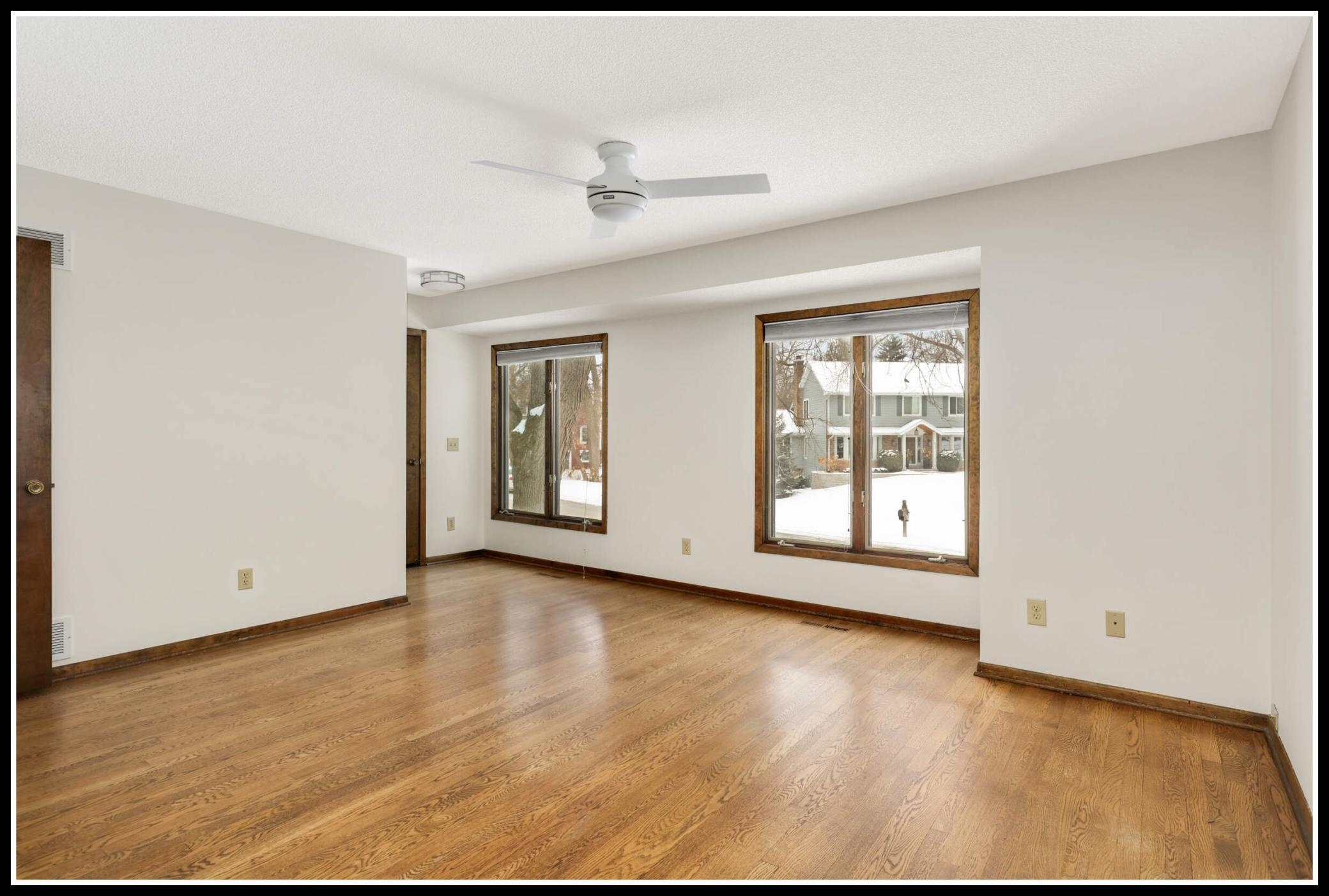 Hardwood floors in the primary bedroom