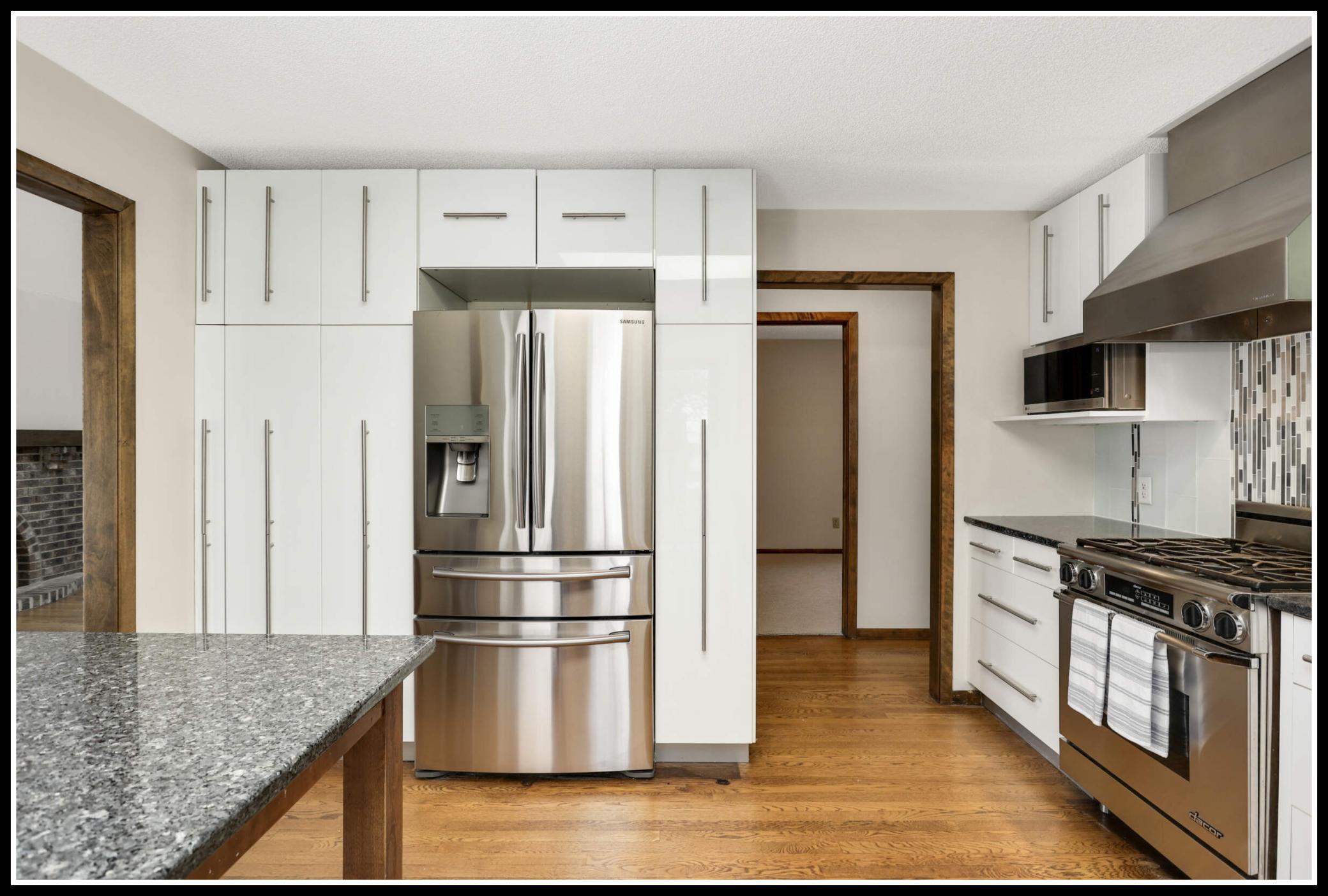 New stainless steel appliances and range hood