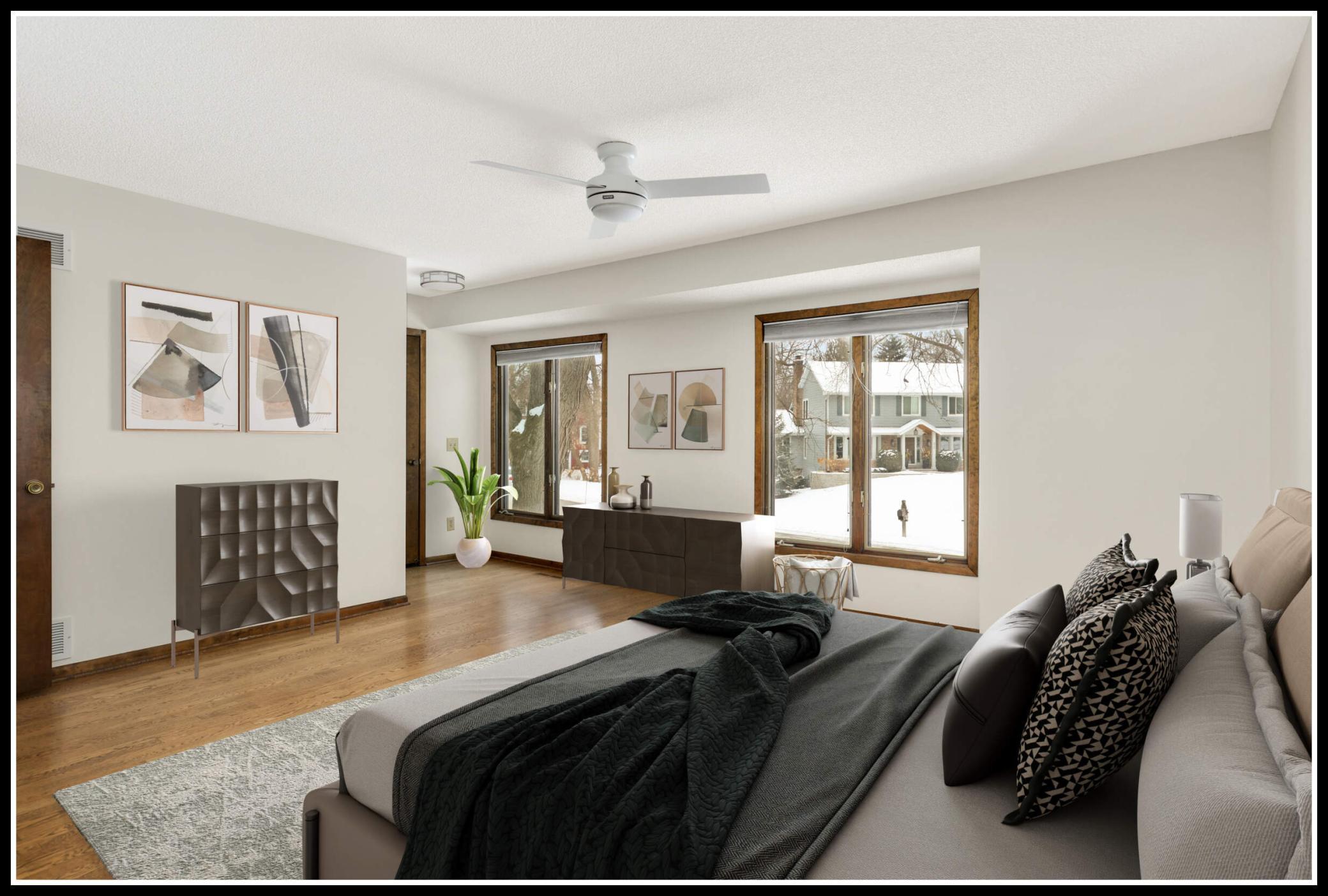 Large primary suite on the main level (virtually staged)