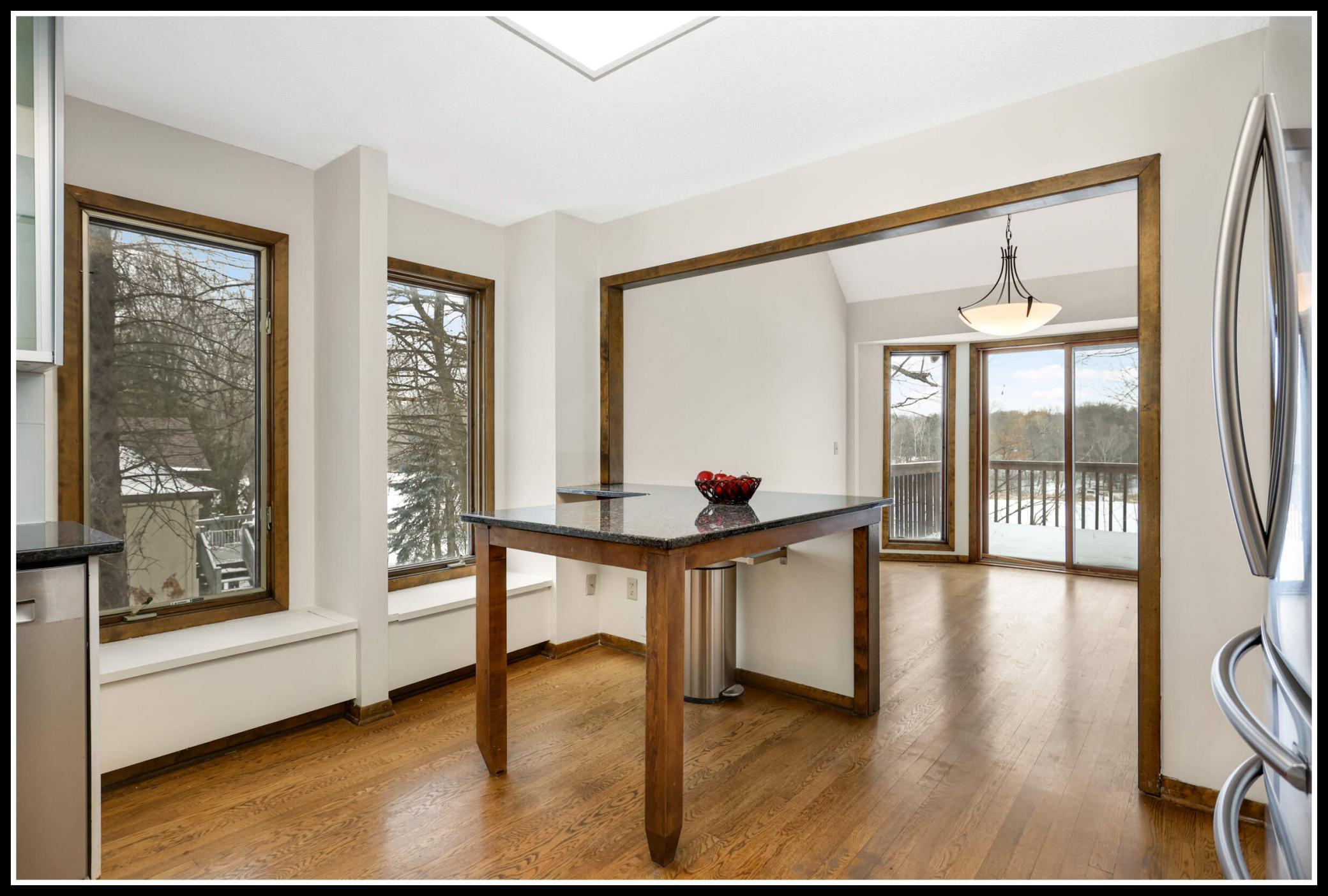 Kitchen peninsula adds prep, serving, and dining space