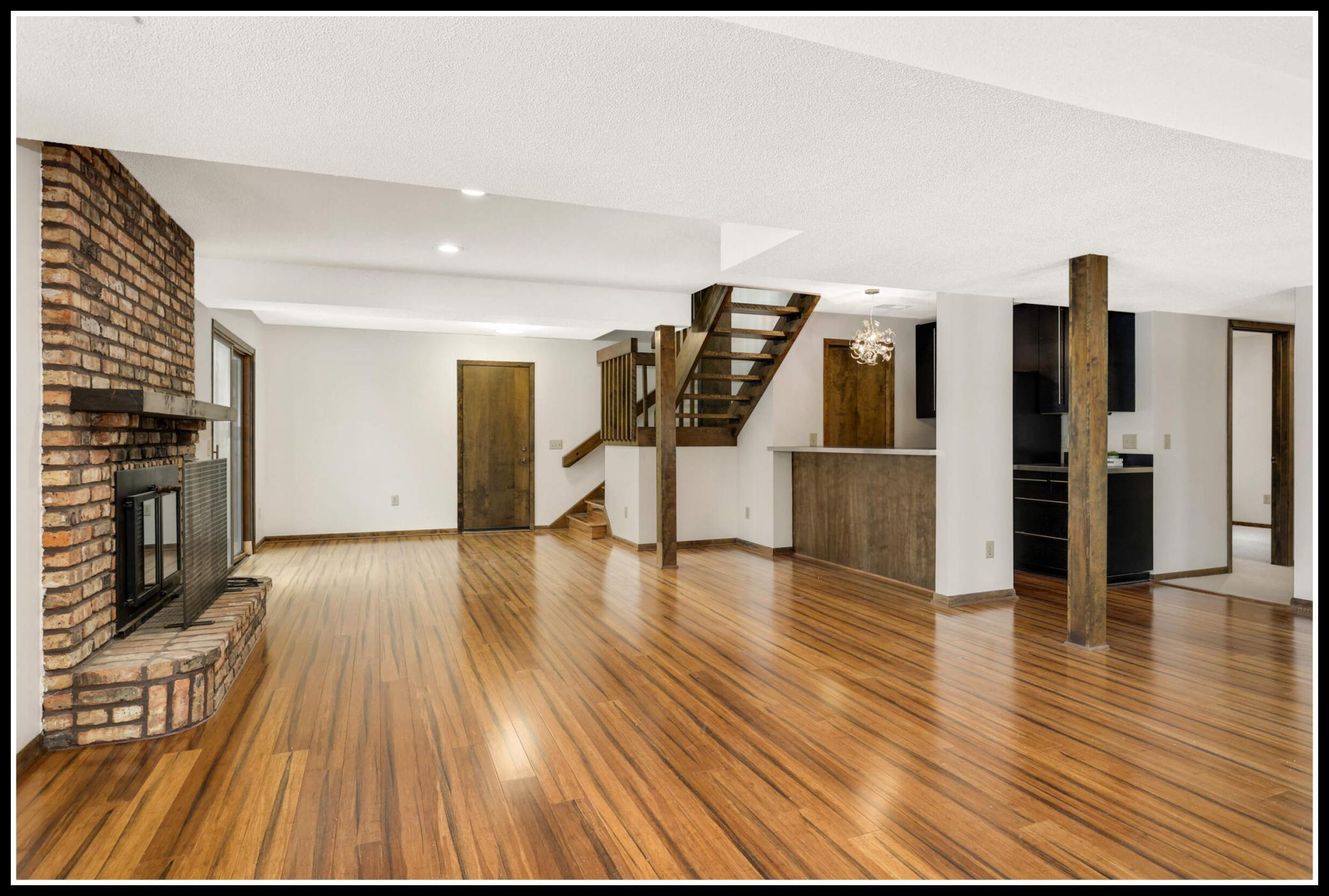 Full finished lower level with room for comfy seating, media set-up, and space to spare!