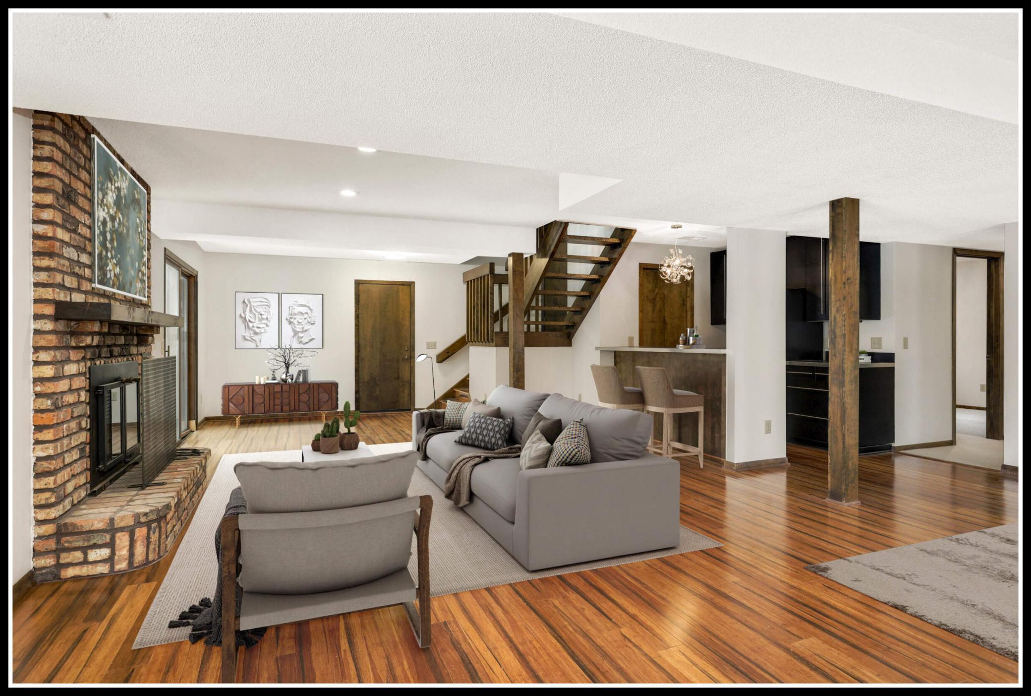 Full finished lower level with room for comfy seating, media set-up, and space to spare! (virtually staged)