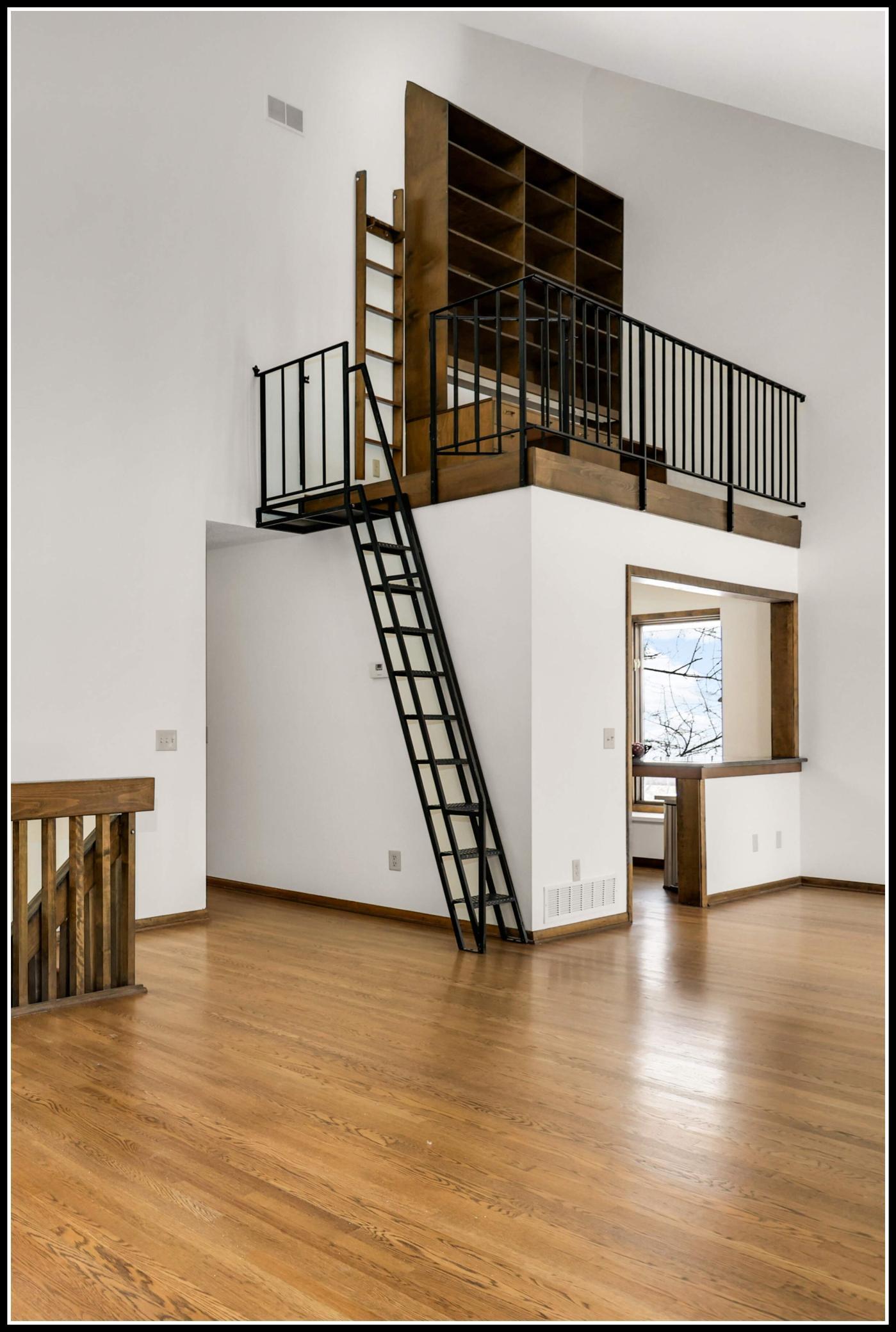 A loft space overlooks the living and dining room