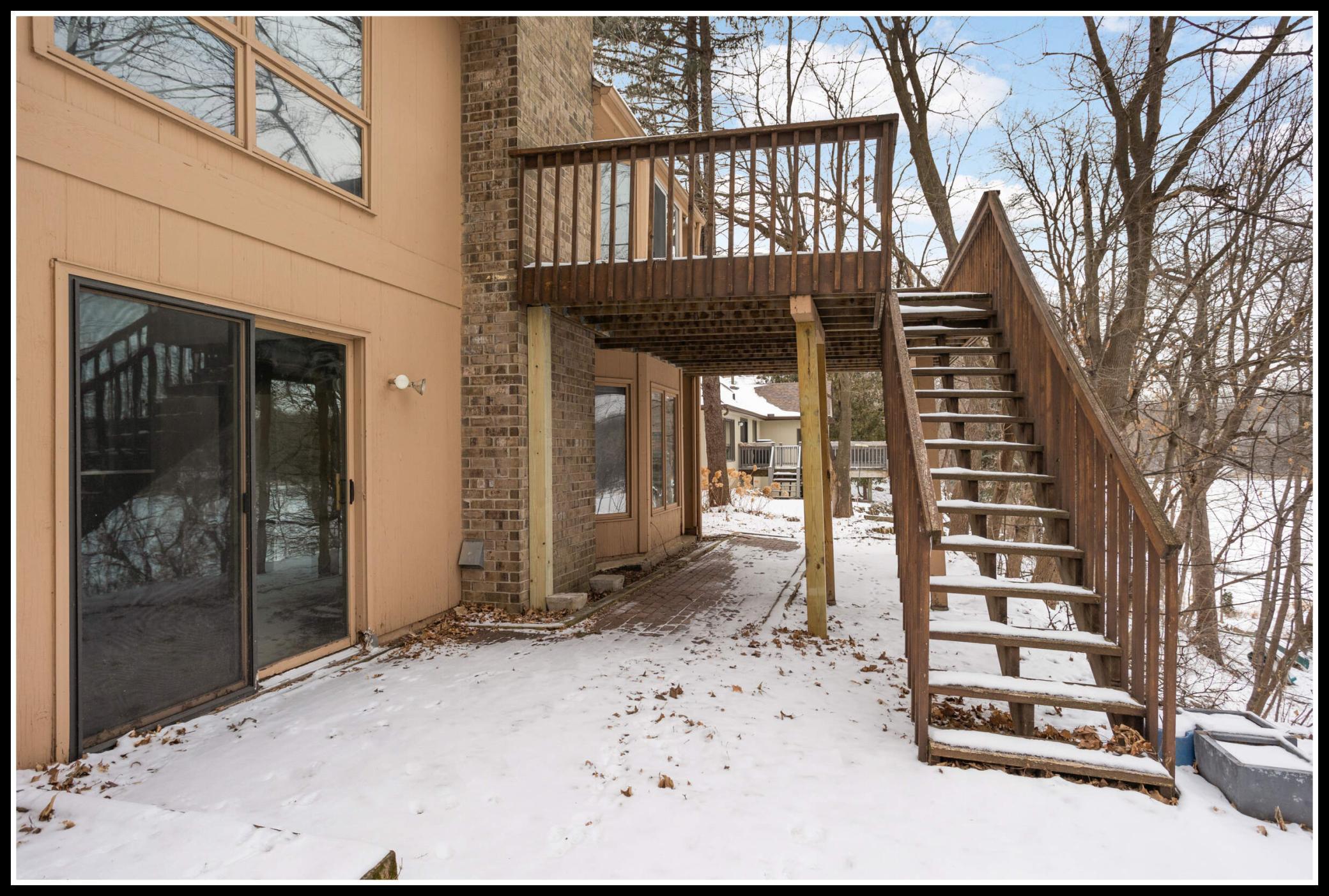 Lower level walk-out to backyard paved patio