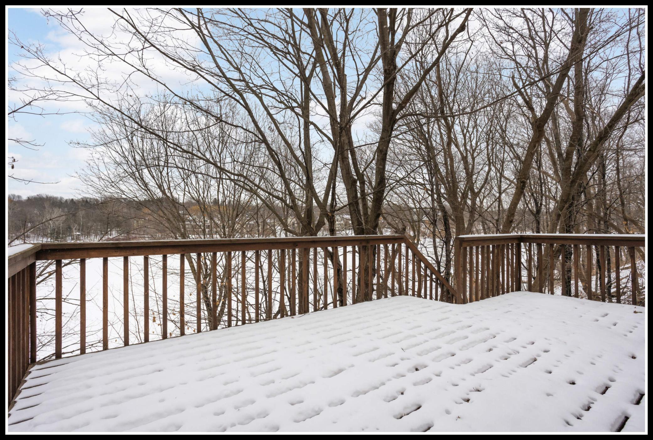 Plenty of space for outdoor dining and lounging with beautiful lake views