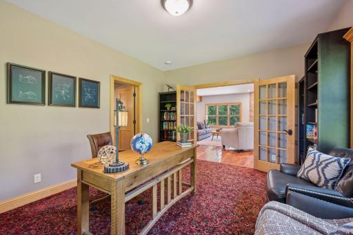 Main floor bedroom with walk in closet and pass through 3/4 bathroom currently used as an office.