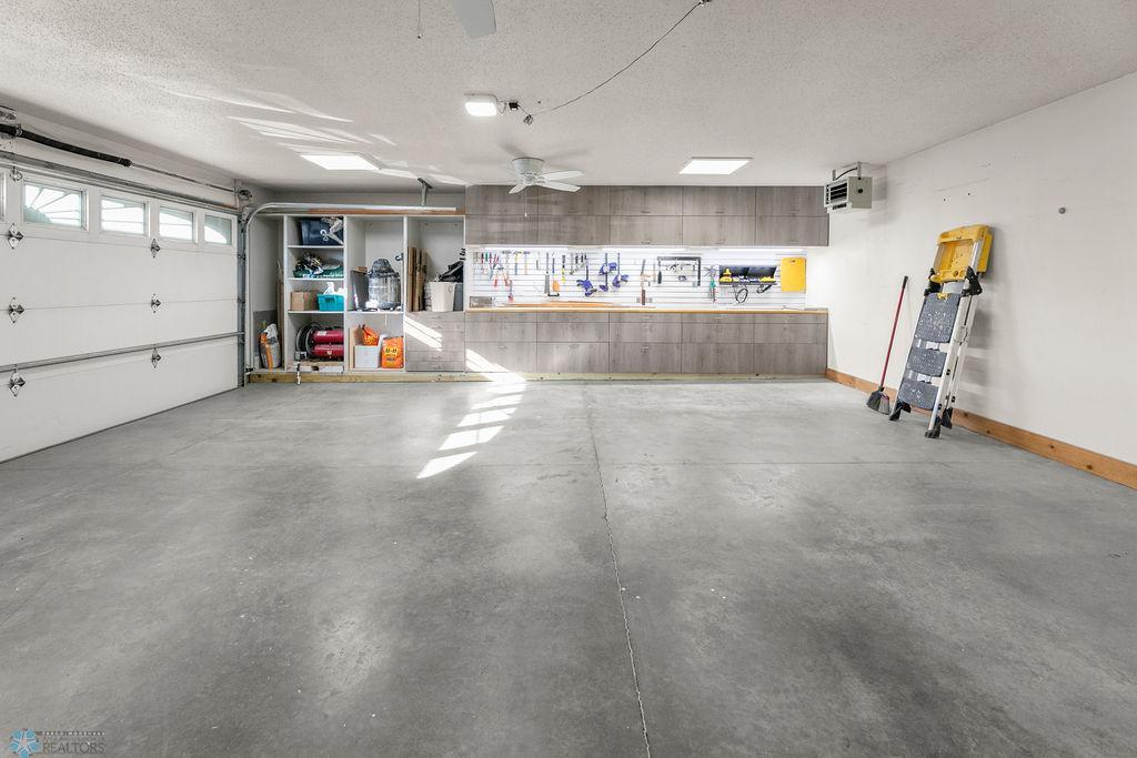 Garage interior w/ Work bench & Storage