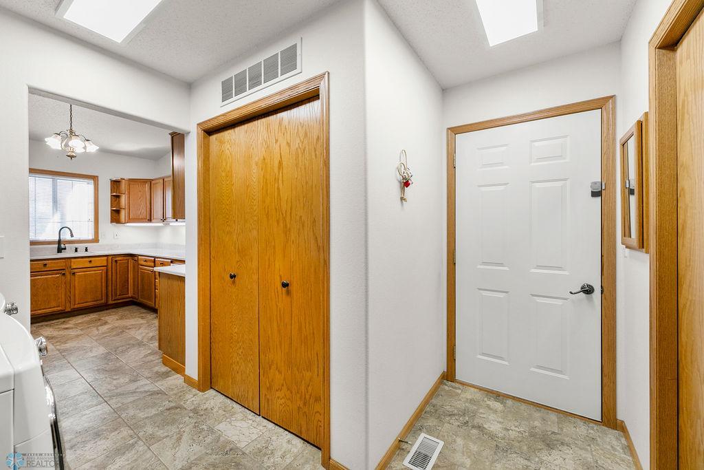 Back entry & Coat closet in large Laundry ROom