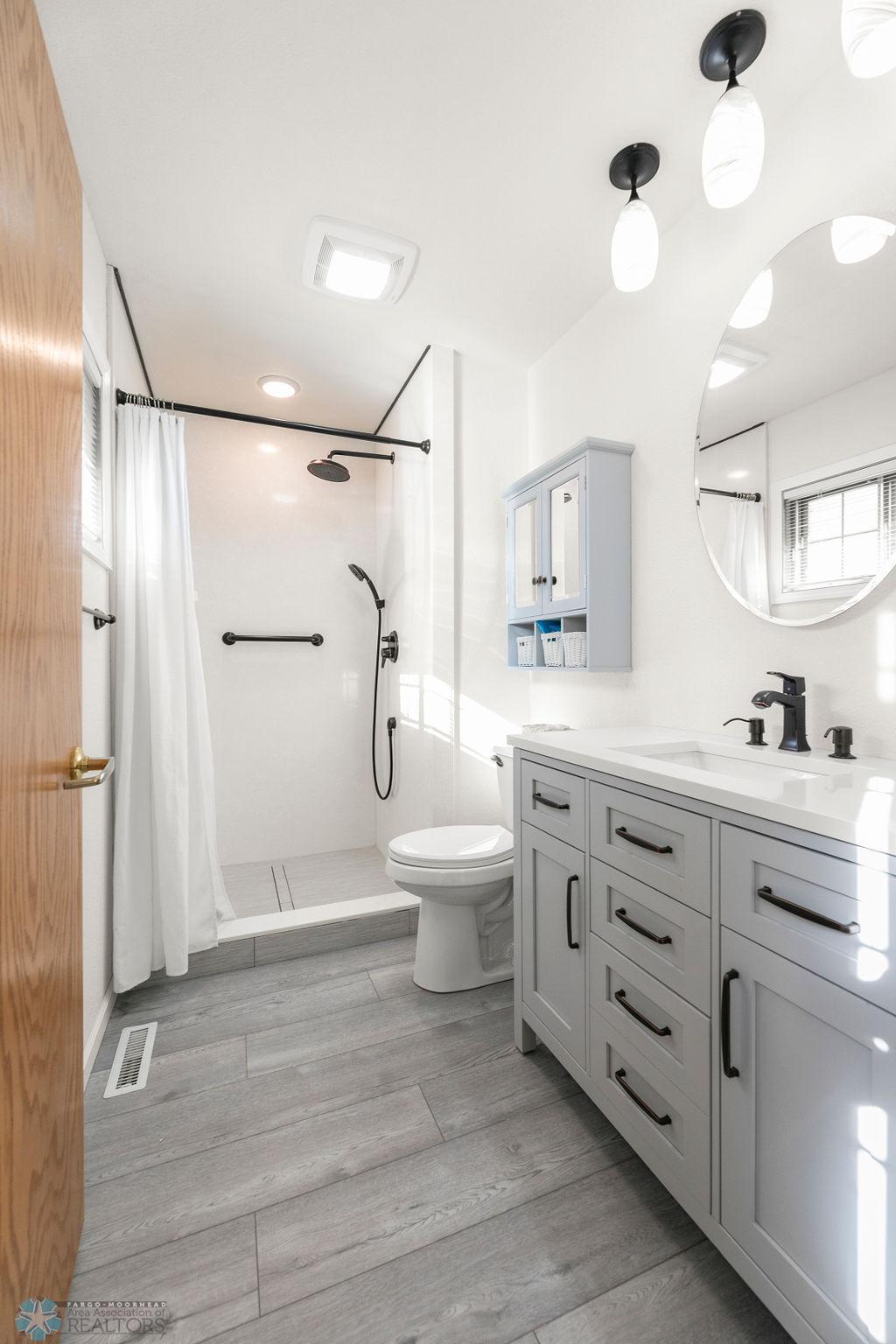Master bath w/ updated vanity & walk-in shower