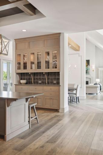 Built in buffet with tile backsplash and lights