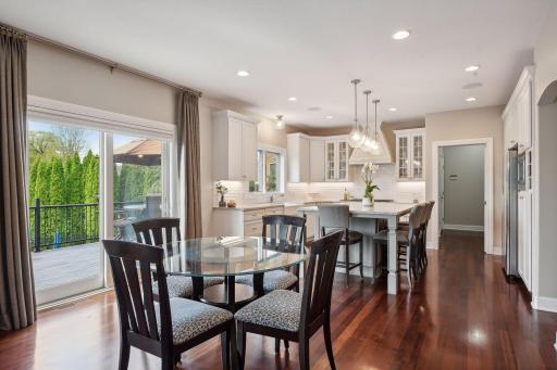 The informal dining area overlooking the deck and pool is a great place to start your day.