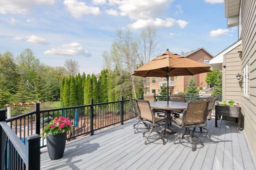 Maintenance free deck is a great entertaining space overlooking the expansive backyard.