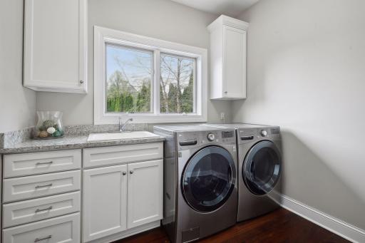 A separate laundry room allows you to shut the door to hide the mess and ample drawer and cabinet space.