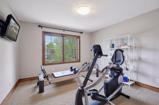 Bedroom 3 is featured as a workout room, but easily converted to a bedroom and has an oversized walk in closet.