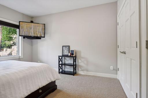 Bedroom 5 on the lower level is conveniently located adjacent to the bathroom.