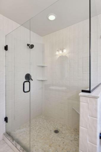 The shower was expanded and new subway tile installed