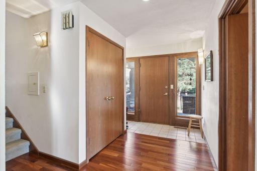 Clean lines and beautiful Cumaru wood plank floors welcome you home