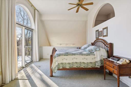 The primary suite is on the top floor and has a vaulted ceiling