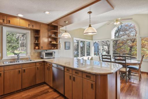 Home chefs will love the expansive peninsula with granite countertops