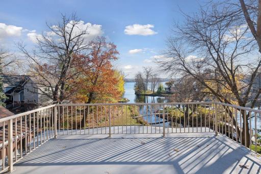 The flat roof deck is the perfect place to take in the gorgeous views of the lake and nature