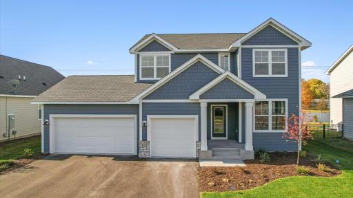 Welcome to 10238 Arrowwood Path! This Kendall floor plan offers a beautifully designed two-story home that combines modern functionality with timeless style.