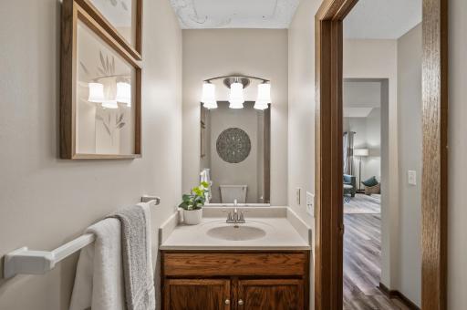 The half bathroom is a stylish and functional space, designed for convenience and elegance.