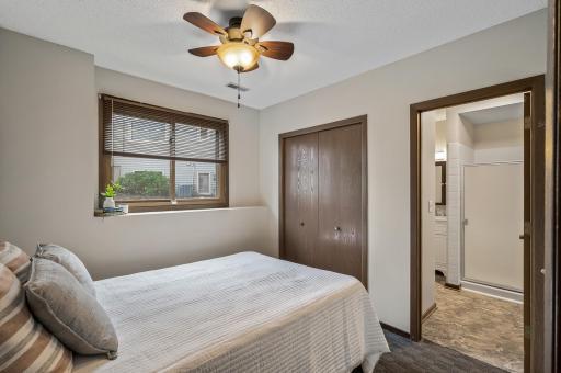 The lower-level bedroom is a cozy and tranquil retreat, designed to provide comfort and relaxation.