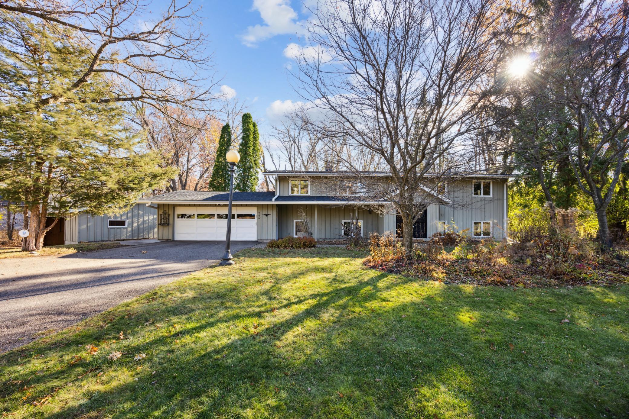 Amazing opportunity to own this beautiful custom built home. Nestled on gorgeous wooded corner lot. (0.67 acre). The home is on Lot 1 and 2nd garage is on lot 2. Both are homesteaded. Original owner has lovingly maintained this property.