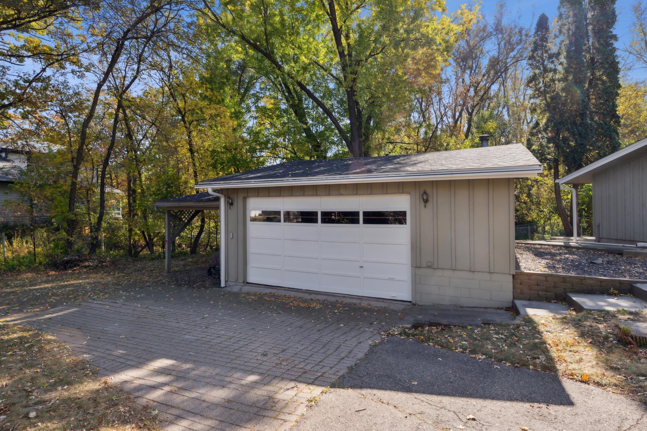 The 2nd garage interior is 30x24 with 8'.5" high overhead door and has an attached Lean-to. No need to pay for off site storage when you can fill these up with your big toys!