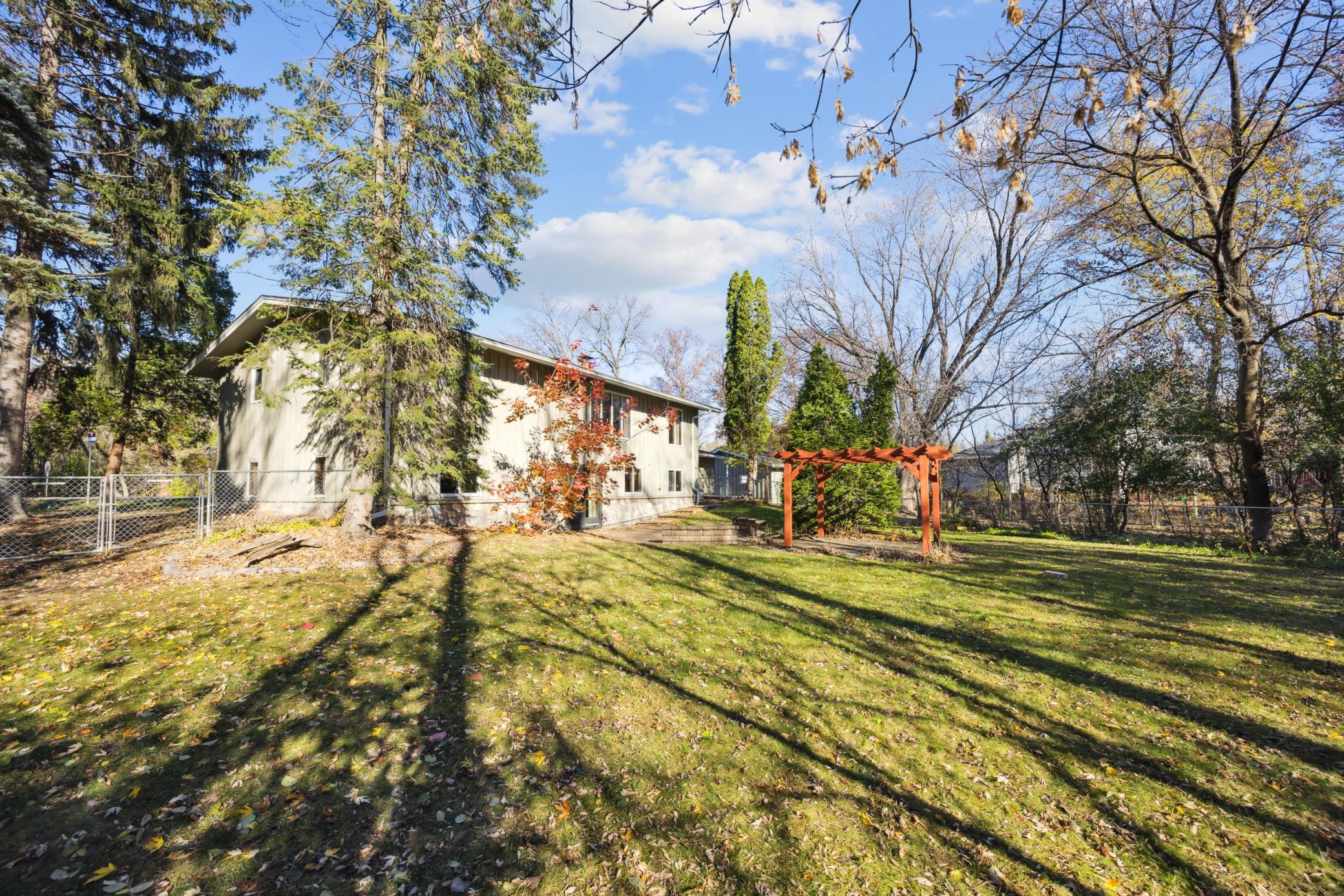 Fully fenced backyard with 2 gates.