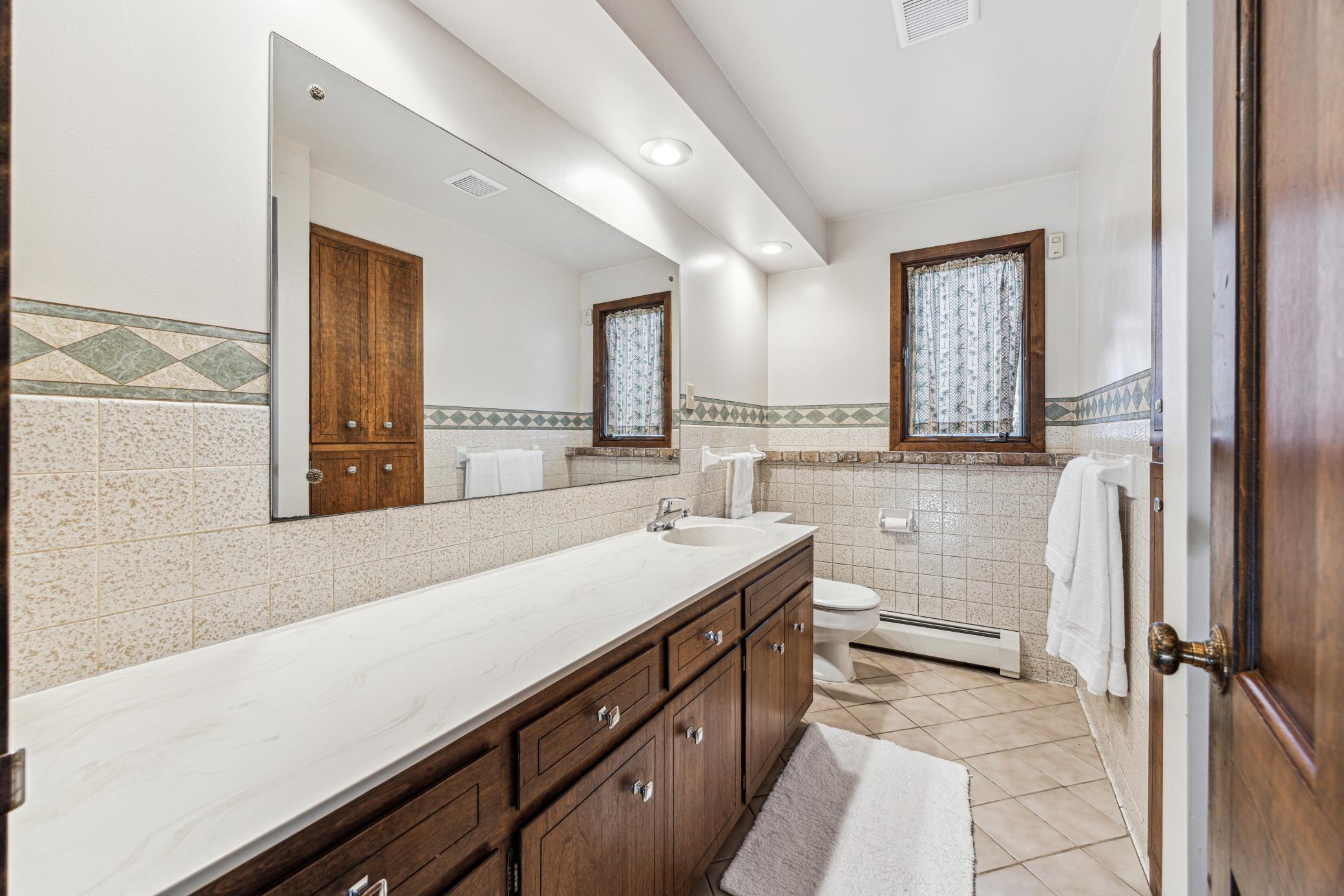 Lower Level 3/4 Bath with shower and lots of storage