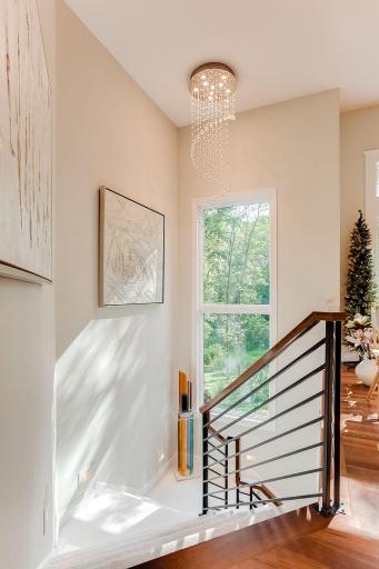 Beautiful new stair railing and lighting to lower level