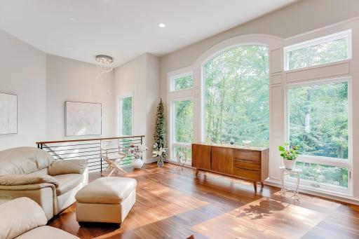 Take in the tranquil views of your private backyard through the massive windowscapes.