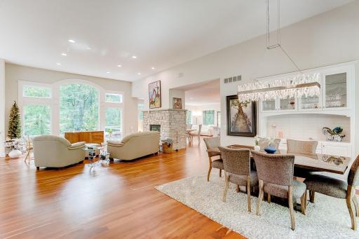 Warm ambiance is inviting from the moment stepping inside. Front entrance opens up to the living room, dining room and glass doors to the study. Main level floors are natural wide plank craftsman cherry.