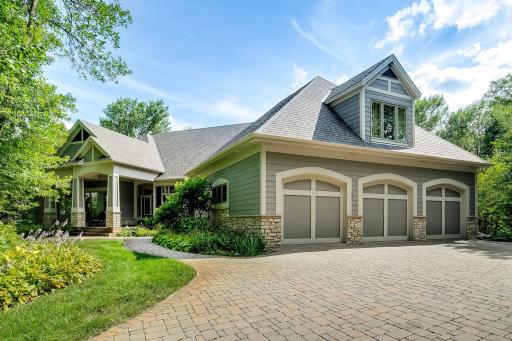 Executive Luxury Rambler, exquisitely appointed exterior and interior finishes.