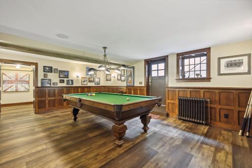 Designed with the English Pub in mind with extensive custom mill work throughout the lower level.