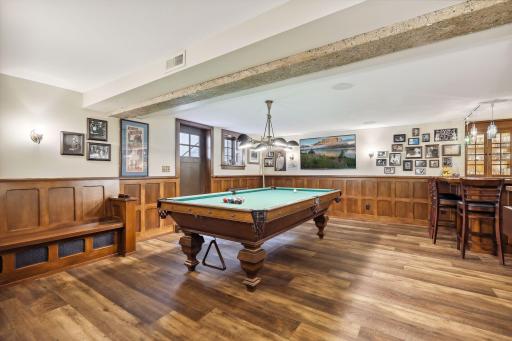 Plenty of room for billiards and an exterior staircase adjacent to the driveway leads to the "pub" entrance.