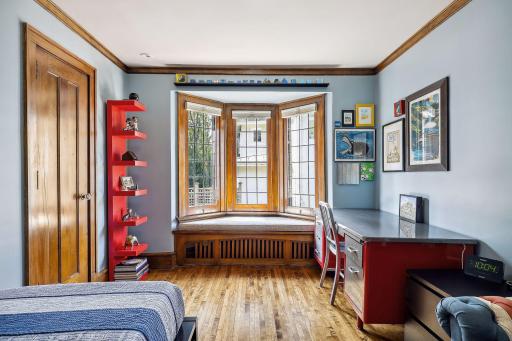 All bedrooms feature window seats and lake views. This bedroom closet features a "secret" hideaway and reading nook.