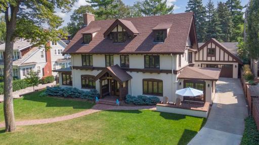 Welcome to 2727 E Lake of the Isles Parkway. A serene setting offering the sought-after City Lakes lifestyle with excellent walkability, myriad seasonal activities around the lakes, and privacy.