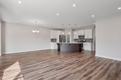 This is your view back toward the kitchen as you stand near the primary suite door. So open and lovely!